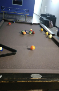 Photo of a billiards table. 